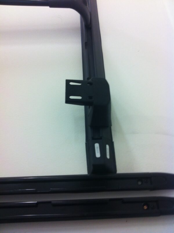 PU-coated Steel mounting brackets for sliding rails. It comes with a T that can be adjusted anywhere on the rail